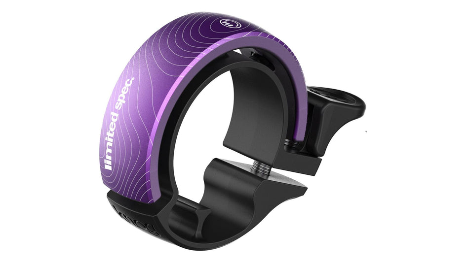 Knog Oi Classic Large Fahrradklingel Spec 001 Limited Collection 23,8 - 31,8 mm khaos purple/black